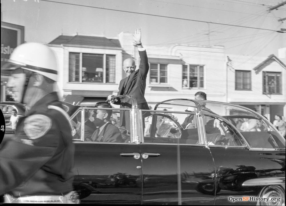 President Eisenhower waves from motorcade on way to Cow Palace for Republican National Convention. August 23 1956 wnp14.3680.jpg