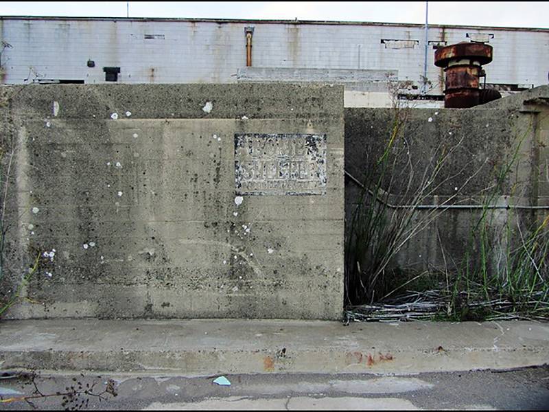 File:Bldg 224 stenciled wall.jpg