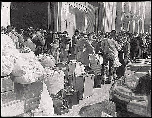 File:Japanese-waiting-On-Van-Ness-to-be-transported-to-camps-1942-by-Dorothea-Lange-via-FB.jpg