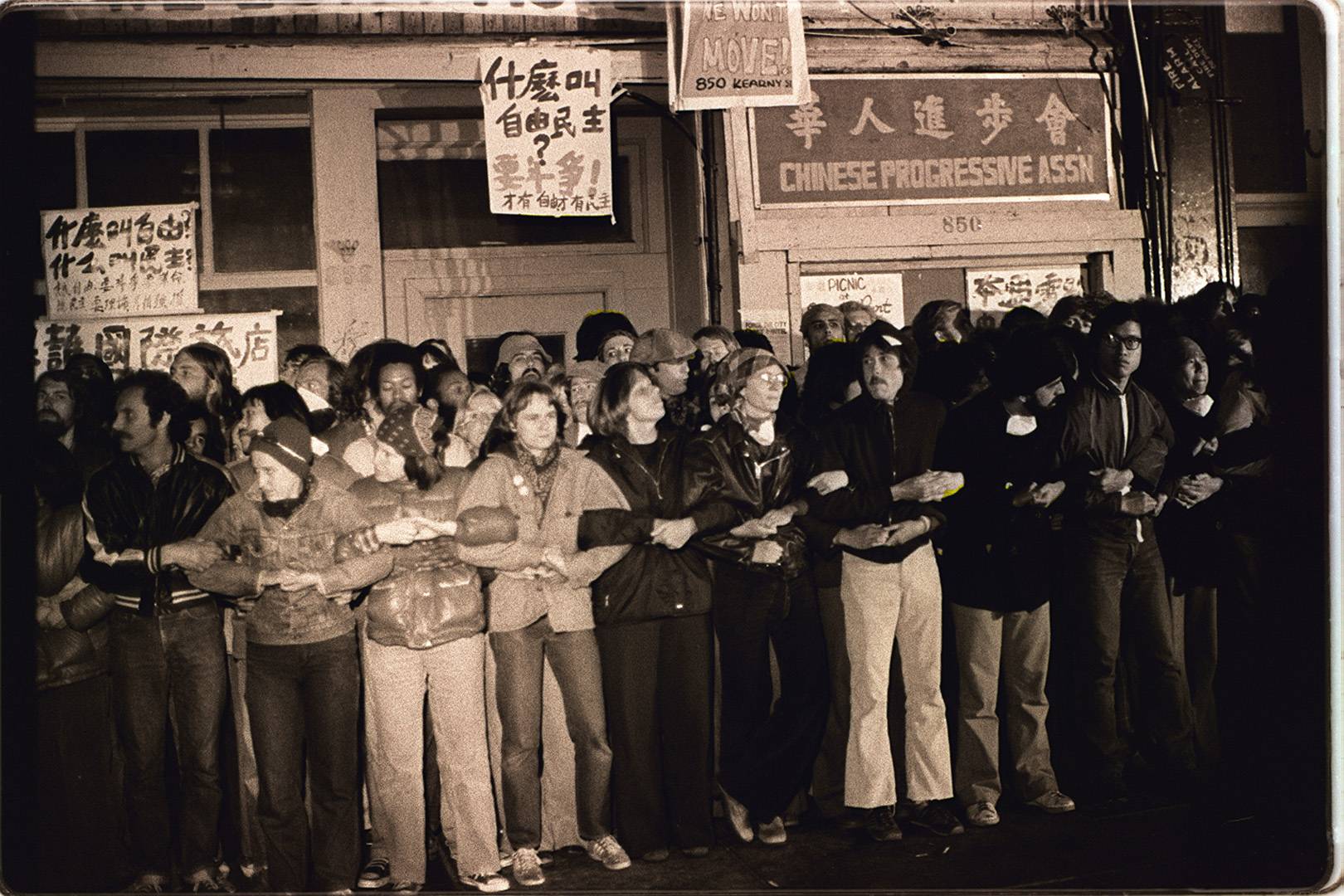 Protesters lock arms to prevent the eviction of the International Hotel tenants, 1977 Nancy Wong.jpg