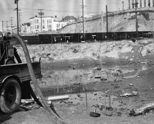 -Gasoline pump draining water from a lot on Market street and Duboce avenue- -graphic- AAB-3412.jpg
