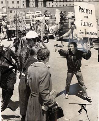 Anti-HUAC demonstrator points at police May 1960 AAK-0830.jpg