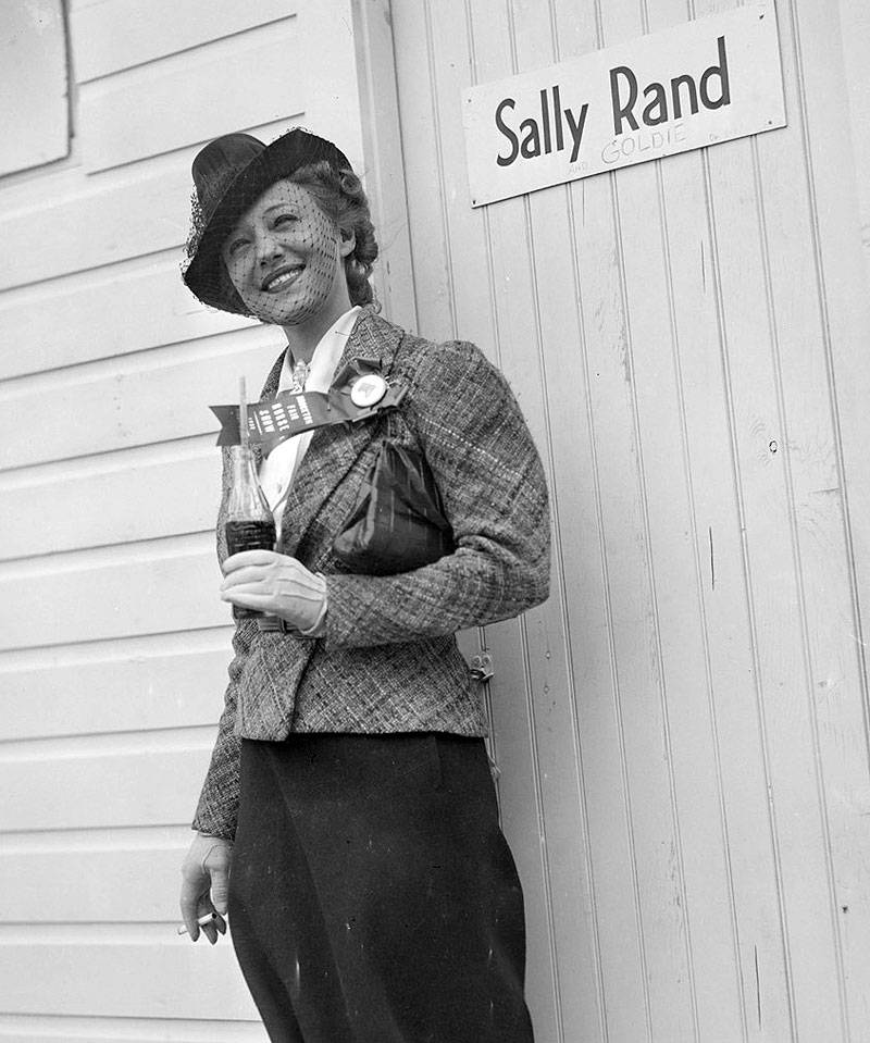 Sally-rand-w-coke-at-dressing-room-door-boston-public-library-7543770422 6731dacb29 o.jpg