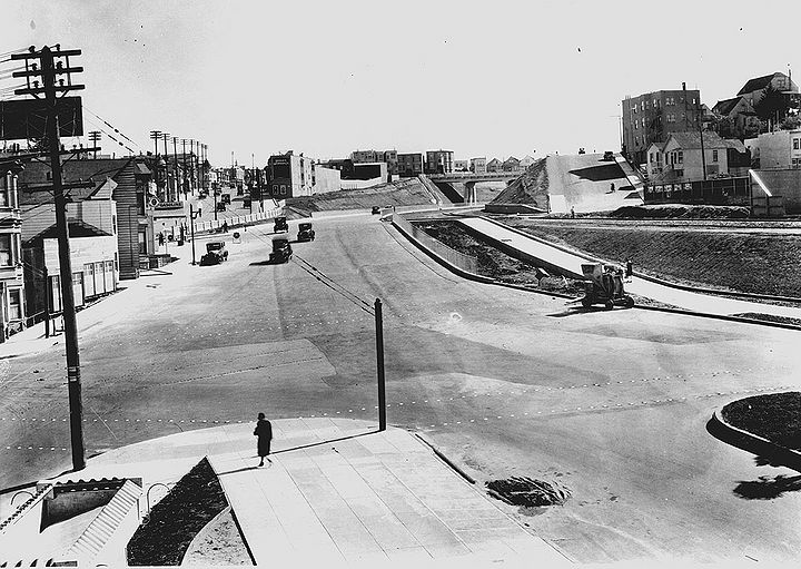 San-Jose-Ave-sw-at-Dolores-and-Randall-w-Mission-back-left--Highland-overpass-in-center-distance-This-was-Opening-Day-for-new-Bernal-cut-April-16-1930-SFDPW.jpg
