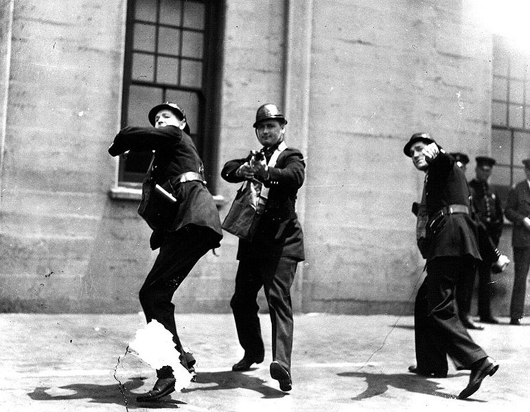 File:Staged-publicity-shot-of-SF-police-practicing-with-tear-gas ILWU-archives.jpg