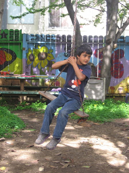 File:Young boy on swing in Jardín Secreto IMG 9299.JPG