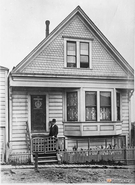 File:55 Anderson (built 1908), west side between Jarboe and Tompkins. Edwardian cottage that looks very similar today. Man poses in front wnp37.02688.jpg