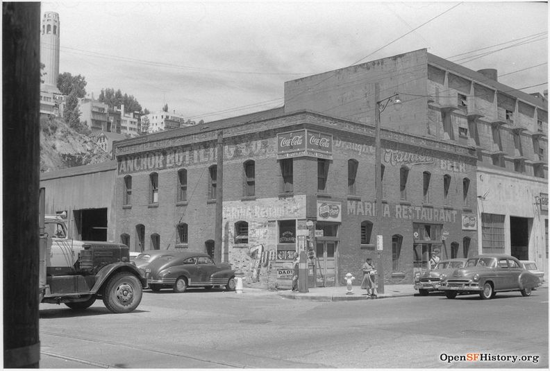 May 1959 Battery and Union Northwest corner of Battery and Union. 1105 Battery, SF Landmark 104, Independent Wood Company, shown here as Marina Restaurant. Now surrounded by Levi Plaza. Coit Tower in background left wnp27.50230.jpg