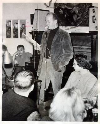 Lawrence Ferlinghetti reading poetry at The Coffee Gallery on Grant Avenue Dec 28 1959 AAD-2816.jpg