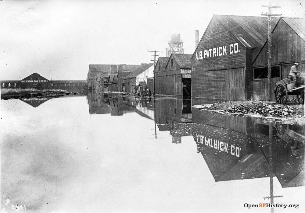 Fairfax Ave. NW from Quint, Cal. Glue works (Fairfax and Rankin) and A.B. Patrick tannery flooded, Southern Pacific viaduct trestle background left dpwbook15 dpw2941 Jan 4 1916wnp36.01142.jpg