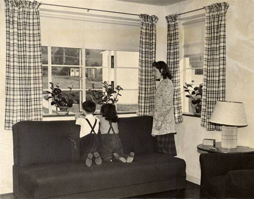 Donald Sanchez, Frances Bonnici and Mrs. Alice Stinchcomb in an apartment at the Sunnydale housing project 1941 AAD-6108.jpg