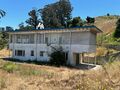 Officers Quarters #10 Rear view facing the road (2024)