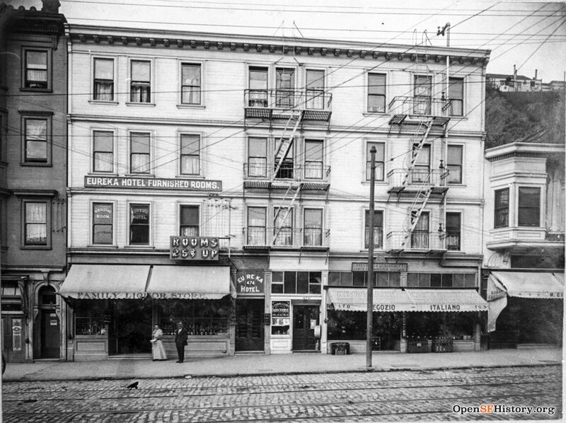 Broadway nr Kearny 1910 View of north side of block. Eureka Hotel building at 474, but flanking building still stand. Family Liquor Store, Cavagnaro n DeBenedetti mens clothing storewnp33.03312.jpg