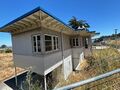 Officers Quarters #10 Rear view facing the road (2024)