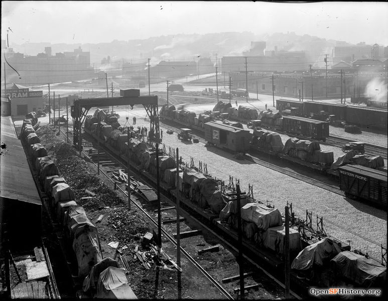 File:Ninth-&-Brannan-circa-1920-view-toward-the-south-of-the-Western-Pacific-Railyard,-Pacific-Portland-Cement-Company-at-the-corner-of-9th-and-Brannan-(building-still-stands)-Potrero-Hill-rising-in--wnp30.jpg