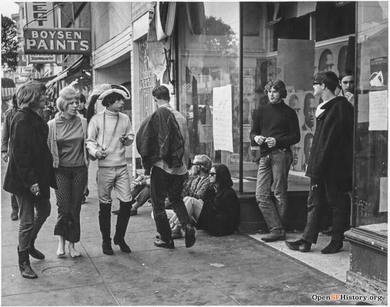 Hippies passing The Print Mint at 1538 Haight Street. Boysen Paints in background. 1967 wnp27.5955.jpg